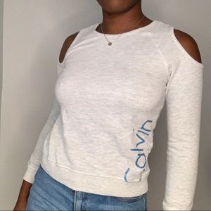 Grey Calvin Klein sweater with shoulder cut outs